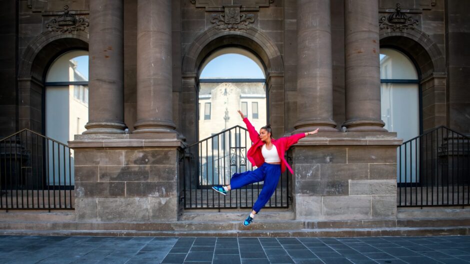 Neve Renwick dancing in front of new Perth museum