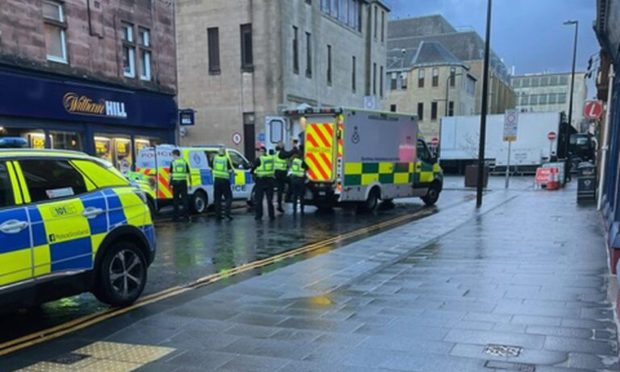 Police on King Edward Street in Perth.