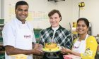 Praveen, left and his wife Swarna, right, pictured with Ashley Connolly of Asda. Image: Morrow Communications