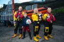 ‘RNLI Lifeboat family’ Megan Davidson (centre), holding daughter Ella, with mother Liz Davidson, right, and Megan’s partner Paul, left, and Paul’s son Harris at RNLI Kinghorn.