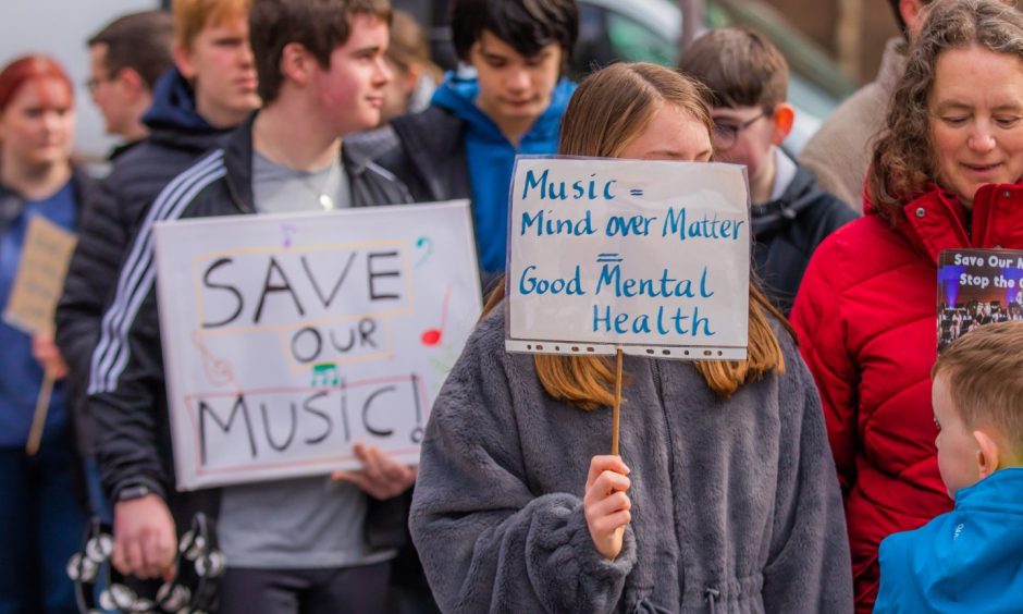 Protest against music cuts in Perth.