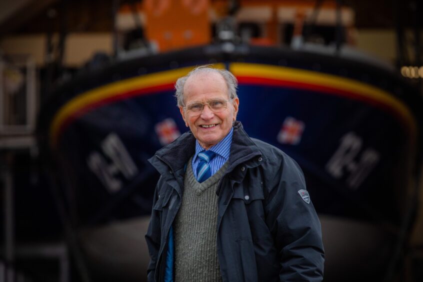 Peter Murray with The Mersey Class lifeboat "Kingdom OF Fife" in the background. 