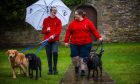 Ruaridh Findlay, 16, with his mum Lynsey Findlay and their dogs