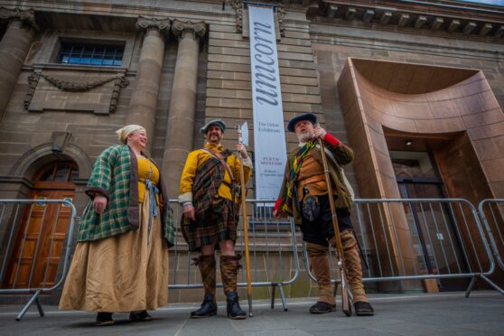 three people dressed as characters from Scottish history outside Perth Museum