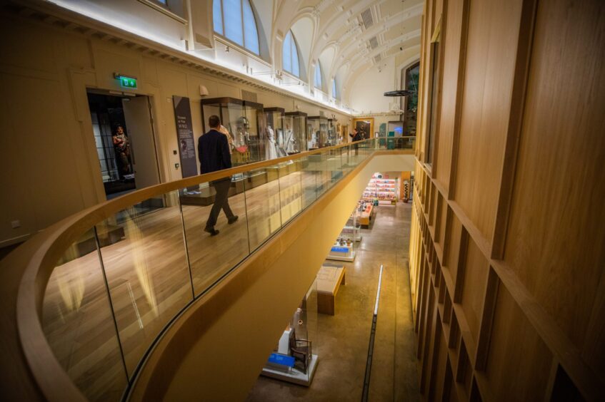 The first floor balcony level provide a view down to the ground floor inside Perth Museum. 
