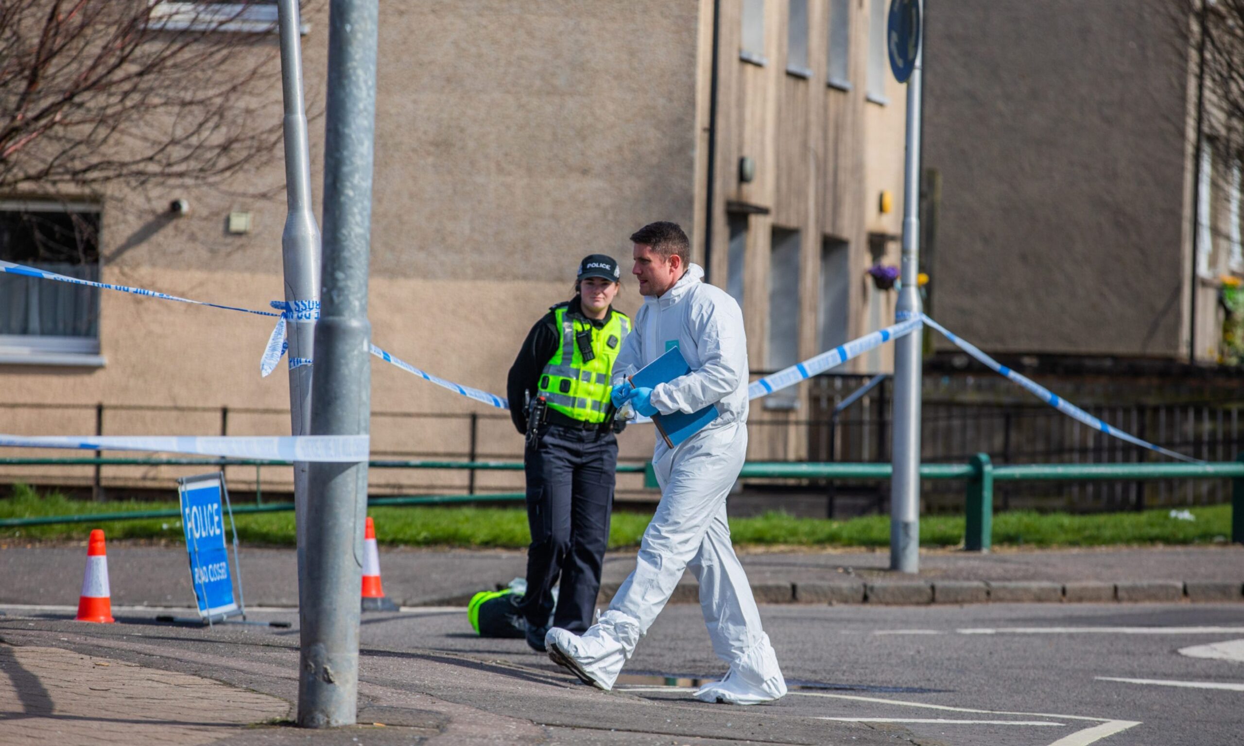 Police and forensics officers in Charleston, Dundee.