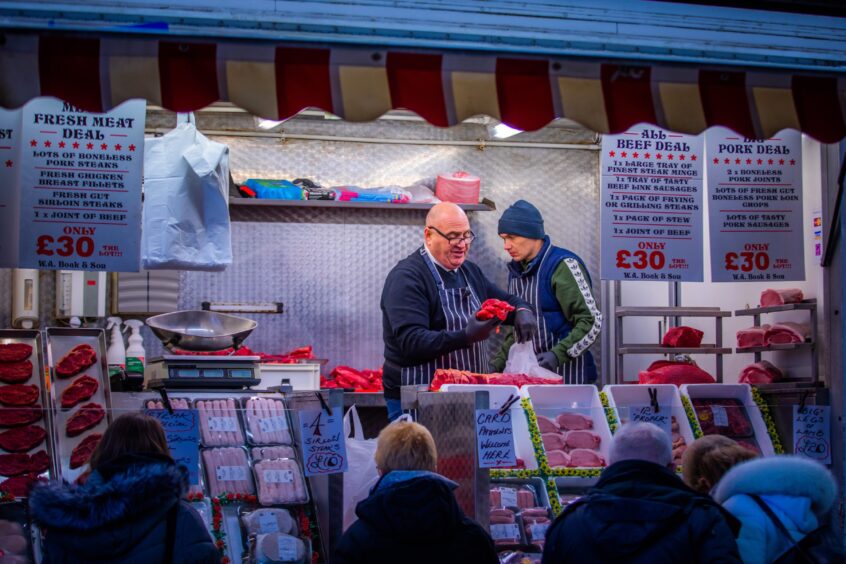 Walter Boak (W A Boak and Son) mans his stall at Errol Sunday Market.