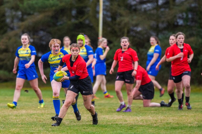 Dundee attacking space during the women's rugby.