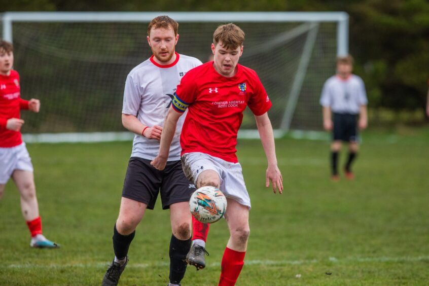 Abertay have control of the ball in the men's football during the Varsity Challenge in Dundee. 