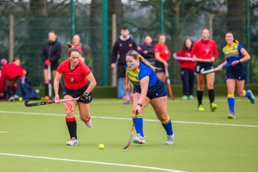 Dundee University tackle a Abertay player in the women's hockey at the Riverside Playing Fields, Dundee. 