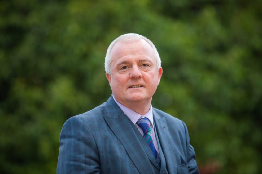 Councillor Peter Barrett in suit and tie