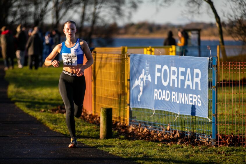 Runners taking part in the Boxing Day run around Forfar Loch. 