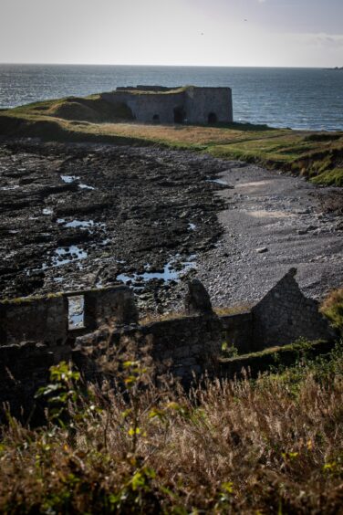 Looking down on the old salmon fishing station - and across to the abandoned lime kilns at Boddin Point.