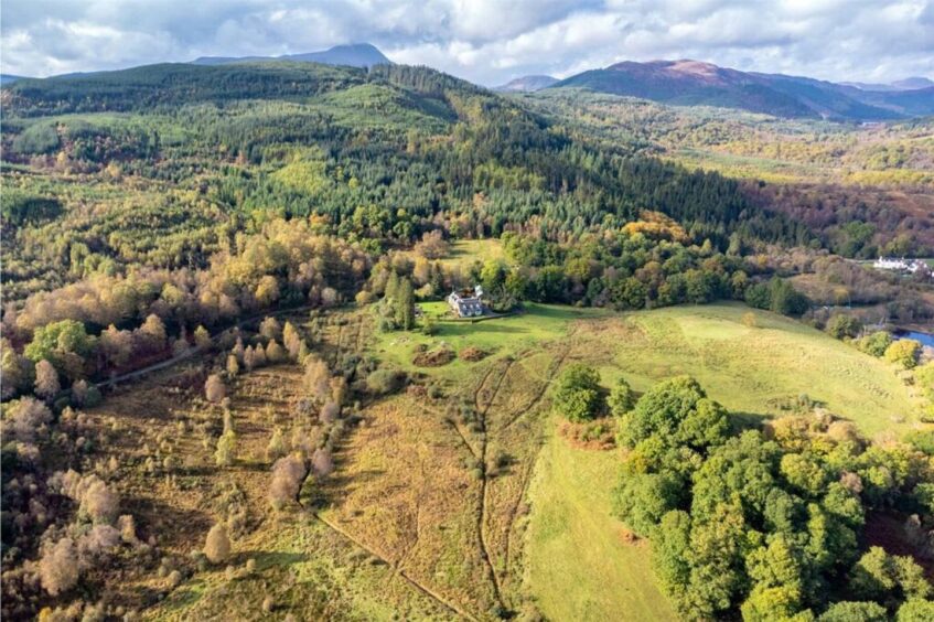 The remote estate with private island is nestled within the Stirlingshire hills.