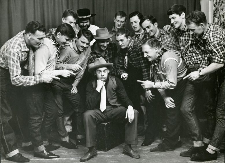 Male cast members from the production of Oklahoma in 1964. 