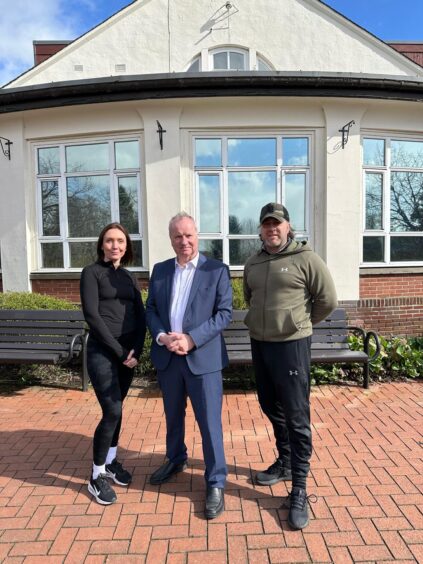 Nicola Bonthrone, Pete Wishart and Murray McDowell standing outside Rodney Pavilion,