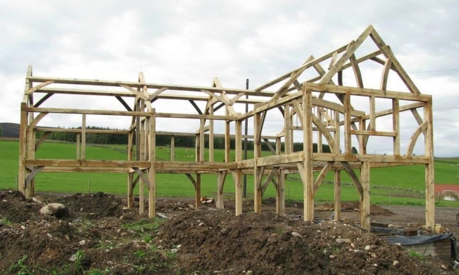 An oak frame structure supports Willow House.