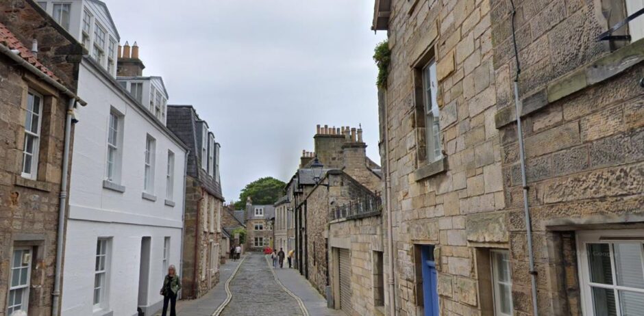 Residents fear loss of daylight in the narrow street.
