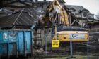 Demolition work underway at Letham Grange. Image: Mhairi Edwards/DC Thomson