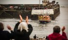 Applause and farewells from crowds lining Arbroath harbour. Image: Mhairi Edwards/DC Thomson