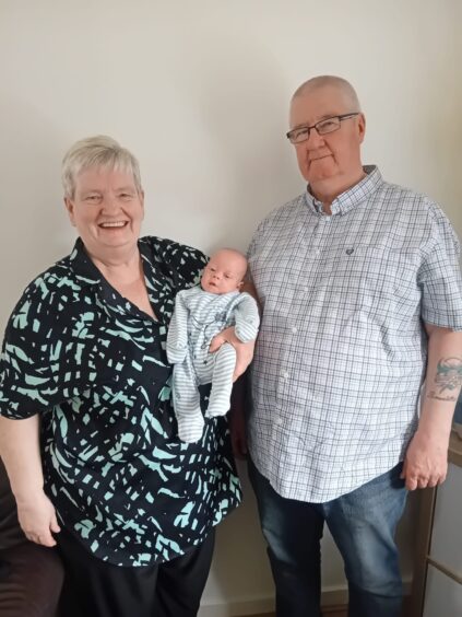Bernadette and Frank Auchterlonie have been a big support to daughter Stephanie. They are pictured with new grandson, Charlie.
