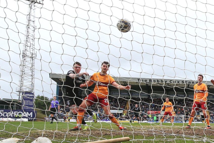 Jordan McGhee opened the scoring for Dundee against Motherwell. Image: Shutterstock/David Young