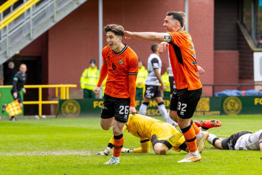 Chris Mochrie celebrates after rippling the net for Dundee United