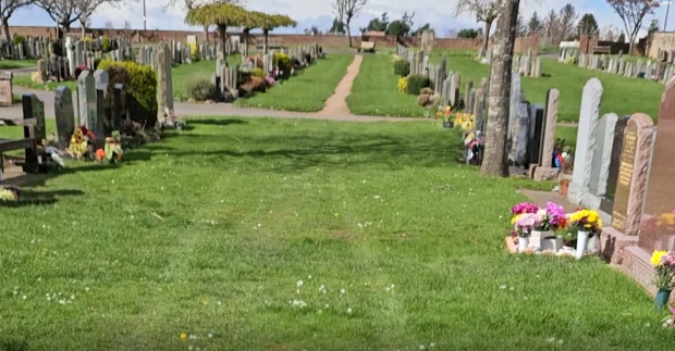 Tyre tracks can be seen on the grass over grave sites at St Andrews Western Cemetery.