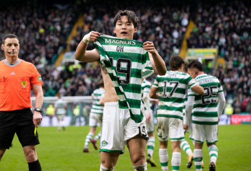 Celtic's Oh Hyeon-gyu celebrates after scoring to make it 2-1 during the match between Celtic and Hibs on march 18 2023.