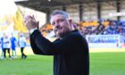 Dundee boss Tony Docherty salutes fans at McDiarmid Park. Image: SNS