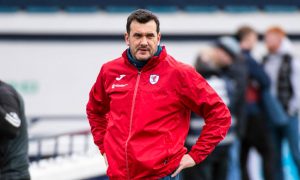 Raith Rovers manager Ian Murray stands with his hands on his hips.