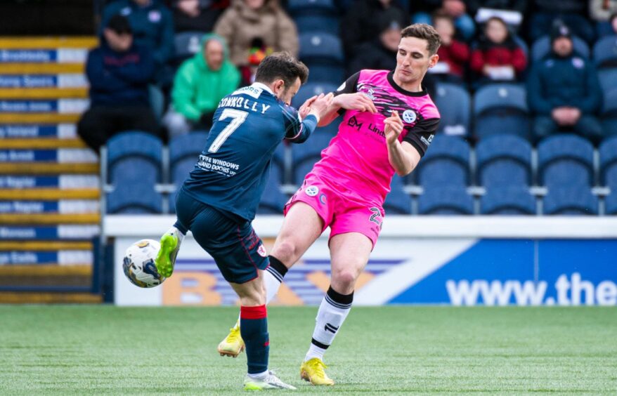 Raith Rovers winger Aidan Connolly challenges for the ball.