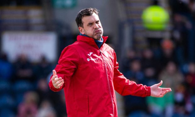 Raith Rovers manager Ian Murray throws out his hands and puffs out his cheeks.