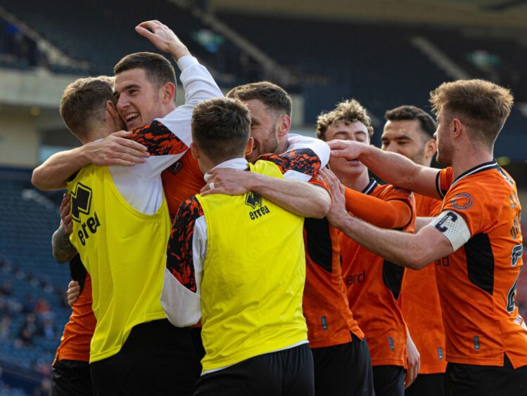 Ross Graham is hailed by his Dundee United teammates