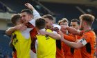 Ross Graham is hailed by his Dundee United teammates