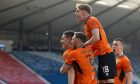 Kai Fotheringham celebrates with his Dundee United teammates