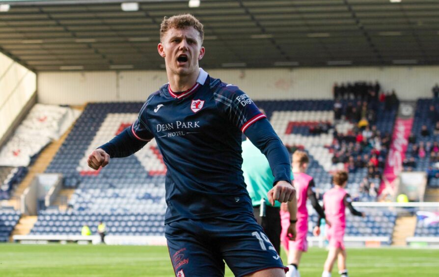 Jack Hamilton celebrates as he scores from the penalty spot to make it 2-1 to Raith Rovers.