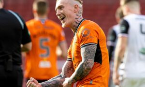A delighted Craig Sibbald after making it 5-0 to Dundee United