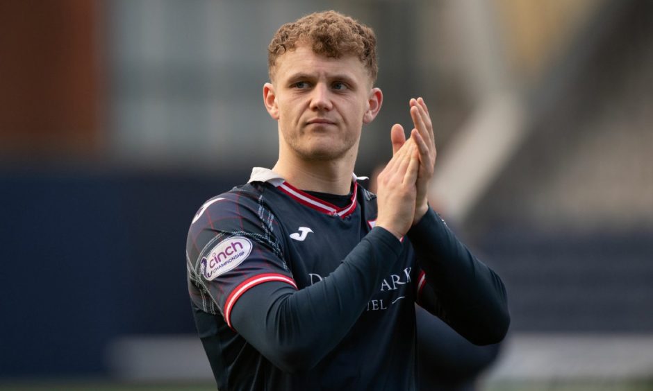 Striker Jack Hamilton applauds the Raith Rovers supporters.