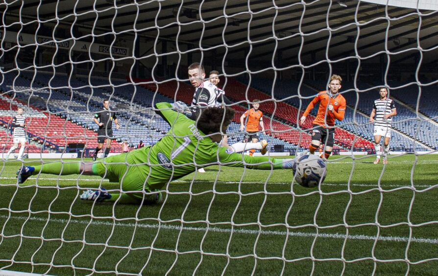 Dundee united's Kai Fotheringham scores at Hampden 