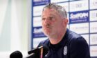 Dundee's Tony Docherty in front of the mics at a press conference