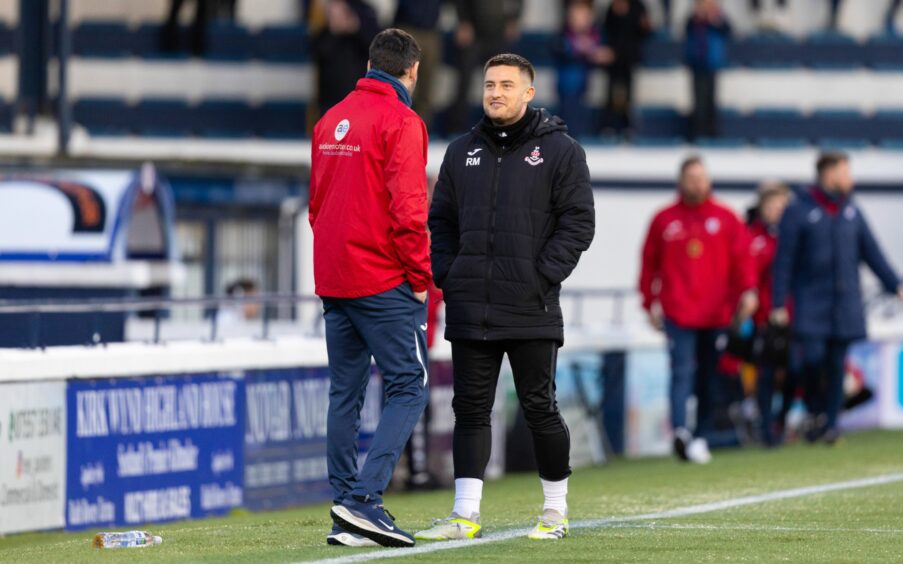 Raith Rovers manager Ian Murray speaks with Airdrie counterpart Rhys McCabe on the touchline at Stark's Park.