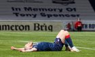 Zak Rudden lies forlorn on the pitch as Raith Rovers lose to Airdrie.