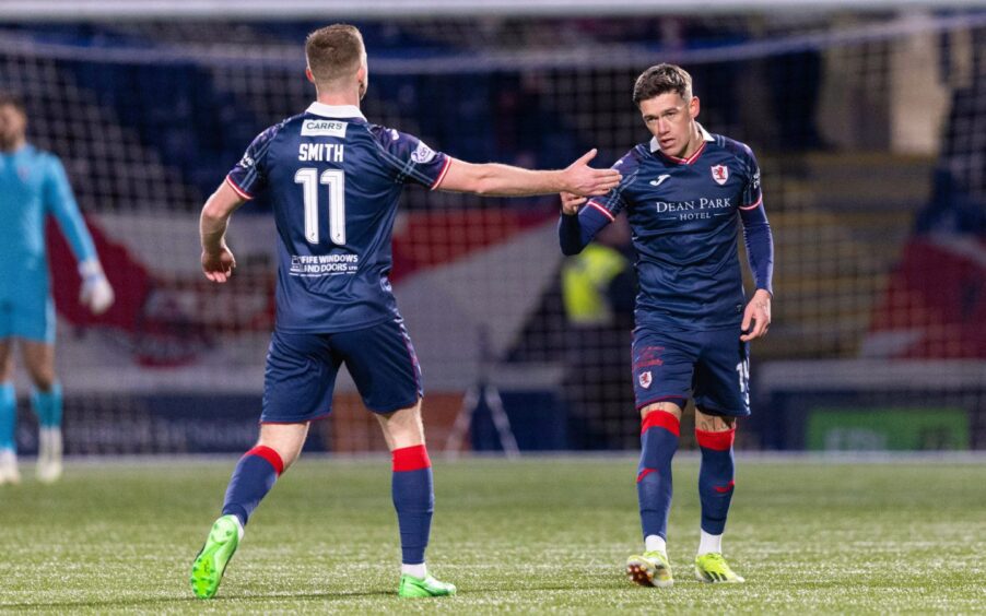 Callum Smith congratulates Josh Mullin after he had pulled a goal back for Raith Rovers against Airdrie.