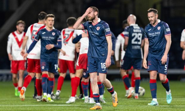 Sam Stanton holds his hand to his head after Raith Rovers' defeat to Airdrie.