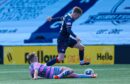 Ben Stanway challenges Kyle Turner in Raith's draw with Partick Thistle. Image: SNS.