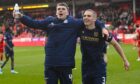 Owen Dodgson celebrates with fellow Dundee FC loanee Owen Beck at Pittodrie. Image: SNS.