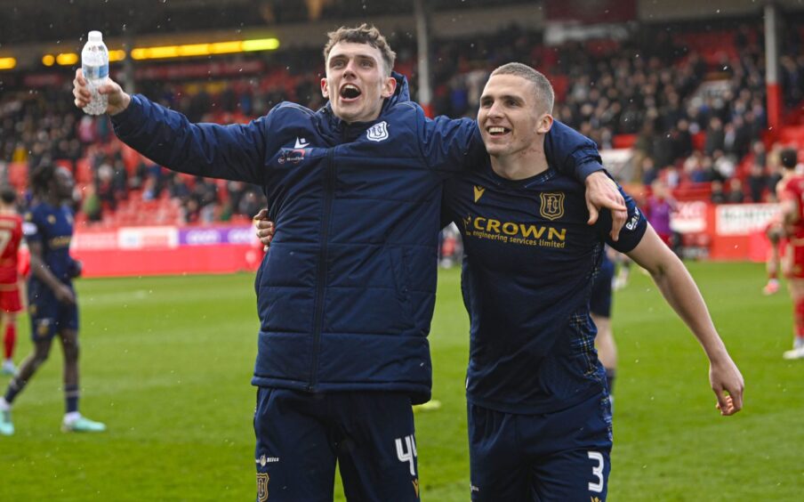 Owen Dodgson celebrates with fellow Dundee FC loanee Owen Beck at Pittodrie.