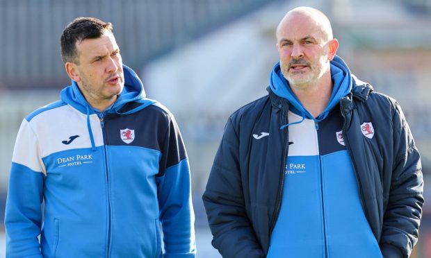Raith manager Ian Murray and technical director John Potter in discussion.