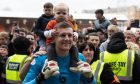 Family man Jack Walton is at the heart of the Dundee United celebrations, as fans flood the field